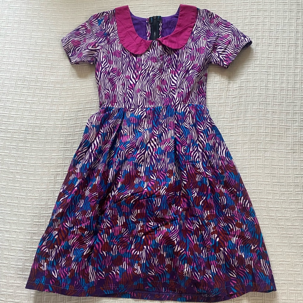 Afrik de Woodin graphic magenta dress.